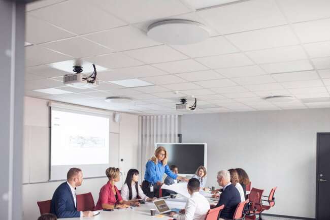 Team of architects and project managers meeting in office